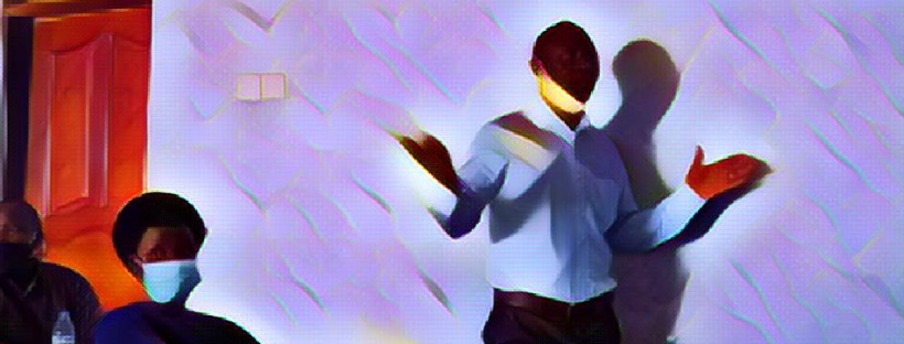 Mosaic of man standing in front of a whiteboard